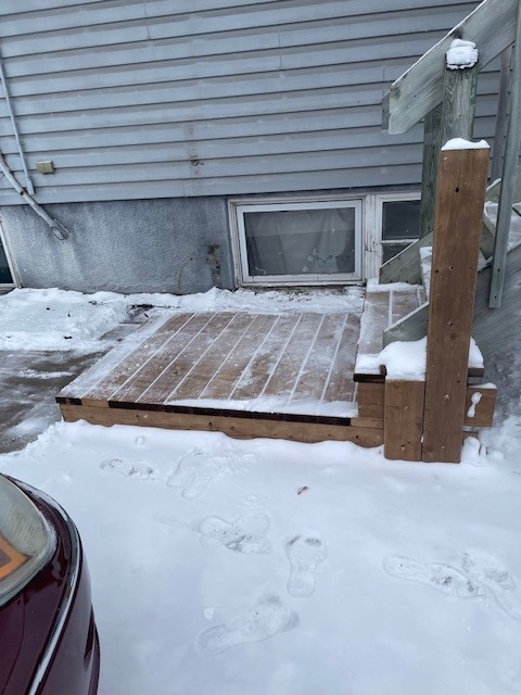 A newly rebuilt wooden deck on the side of the Enniskillen residence in Winnipeg